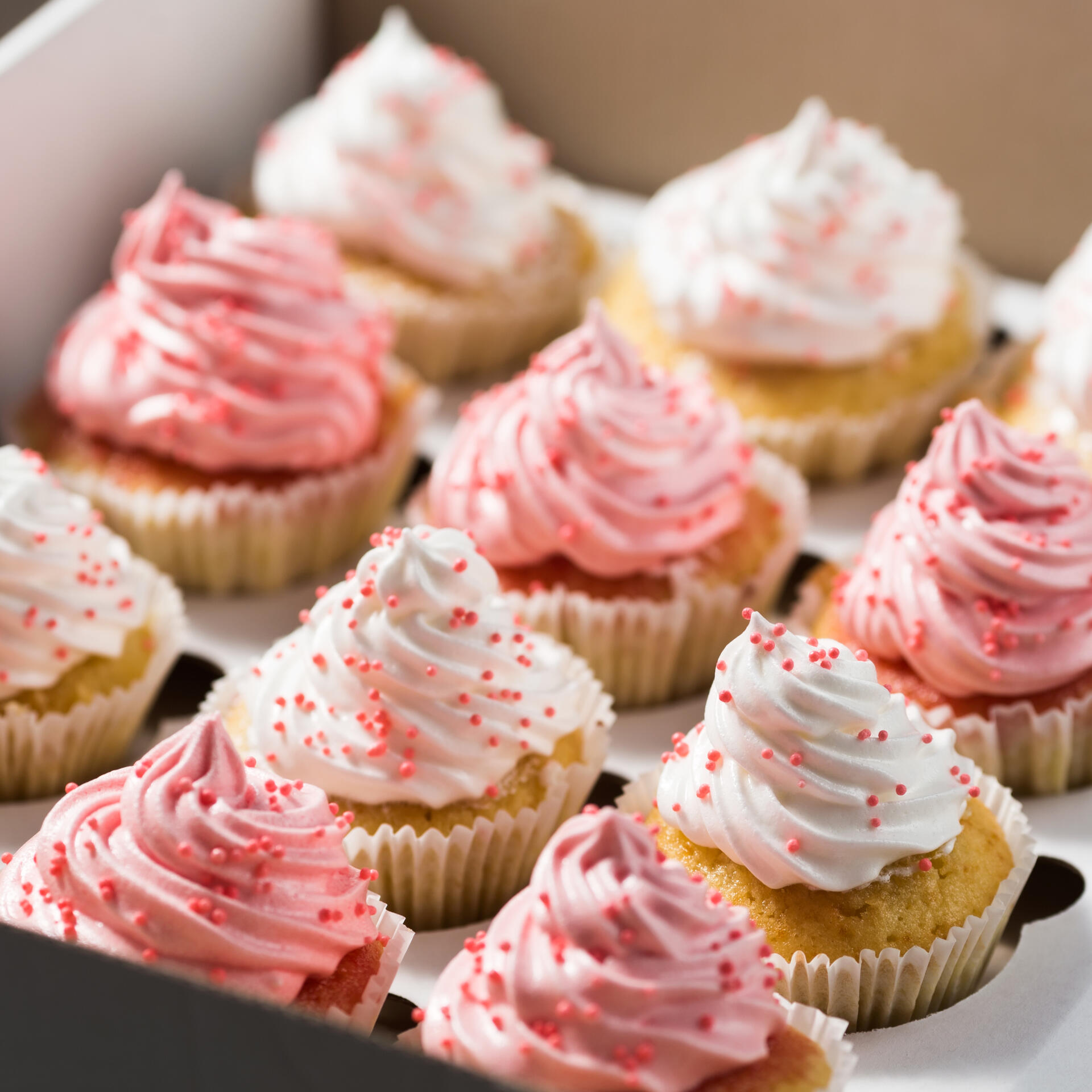 Photo de cupcakes rose et blanc